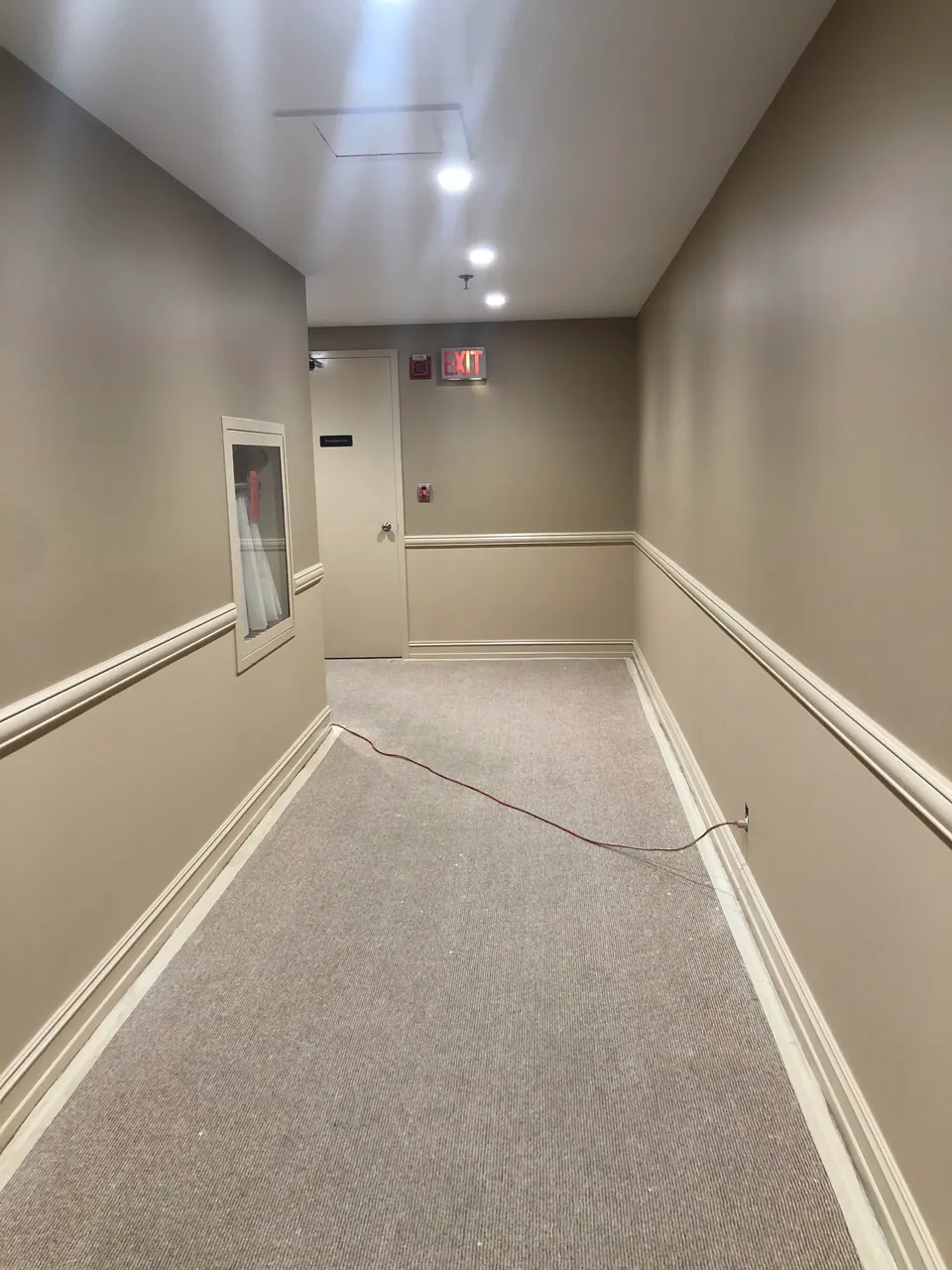 Commercial corridor with freshly painted walls